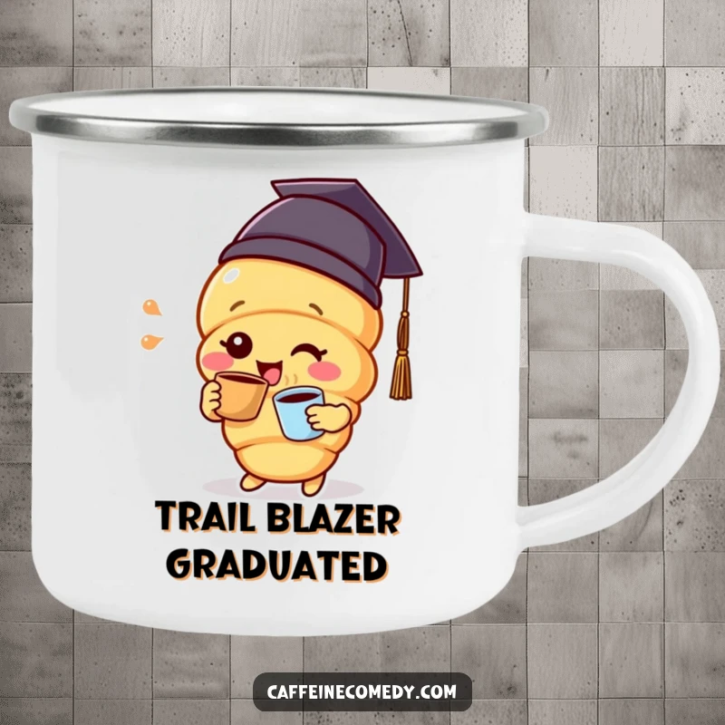 Funny delighted croissant character wearing a graduation cap, sipping coffee, ready for outdoor celebrations on this camping mug.