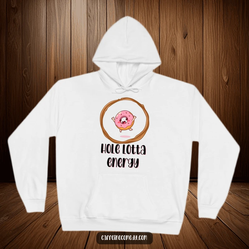 Funny cheerful donut character joyfully leaping through a ring of coffee steam, featured on a soft and warm hoodie.