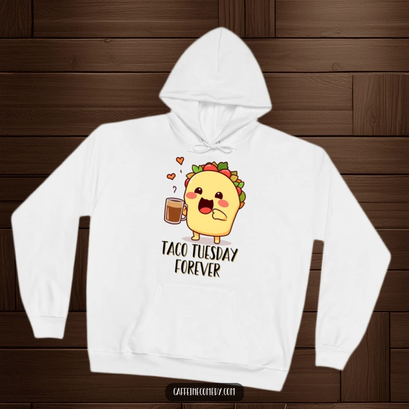 Funny taco character toasting a coffee mug, festive and comfortable hoodie perfect for cozying up with a warm drink.