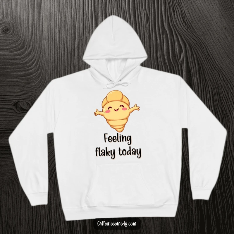 Funny happy croissant character stretching its flaky arms, featured on a soft and warm hoodie for maximum coziness.