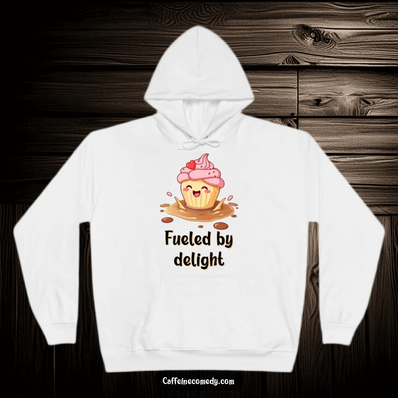 Funny Cupcake Hoodie: A smiling cupcake splashes in coffee, offering cozy sweetness and comfort, a perfect funny gift.