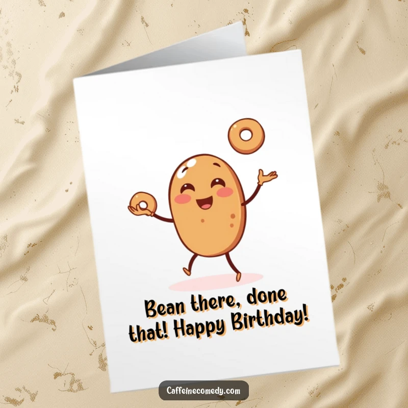 Funny Free Printable Birthday Card: Cheerful coffee bean artistically juggling three mini bagels with a smile, perfect for gifting.