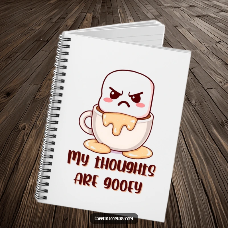 Funny grumpy kawaii marshmallow melting into hot chocolate, featured on a notebook cover for jotting down cozy thoughts.