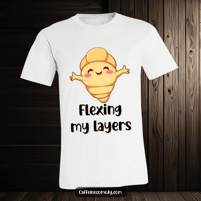 Funny happy croissant character stretching its flaky arms, depicted on a soft and humorous t-shirt for ultimate comfort.