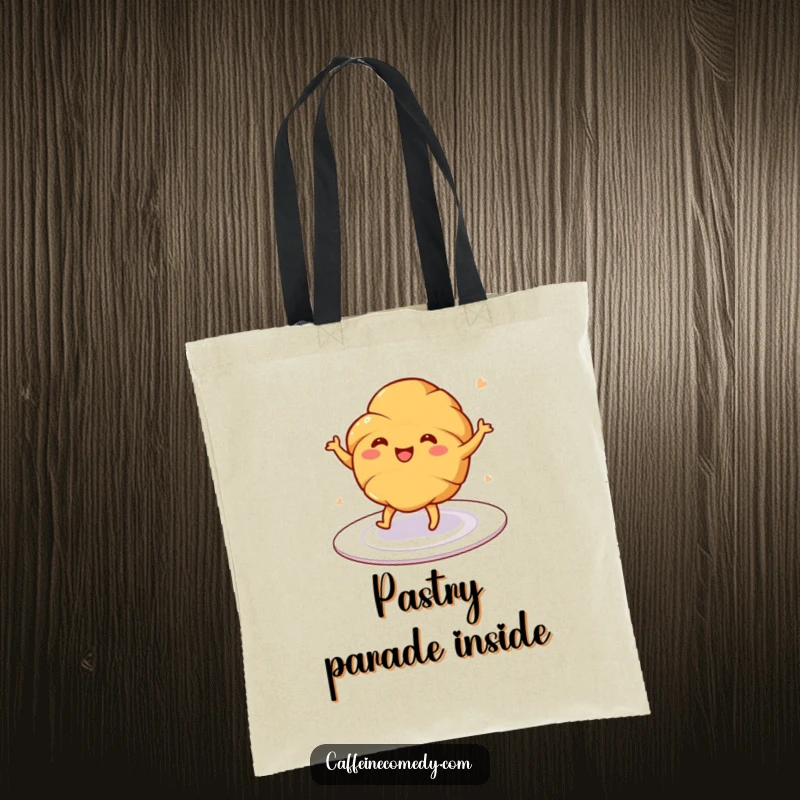 Funny tote bag featuring a happy, dancing croissant illustration, great for shopping and everyday use.